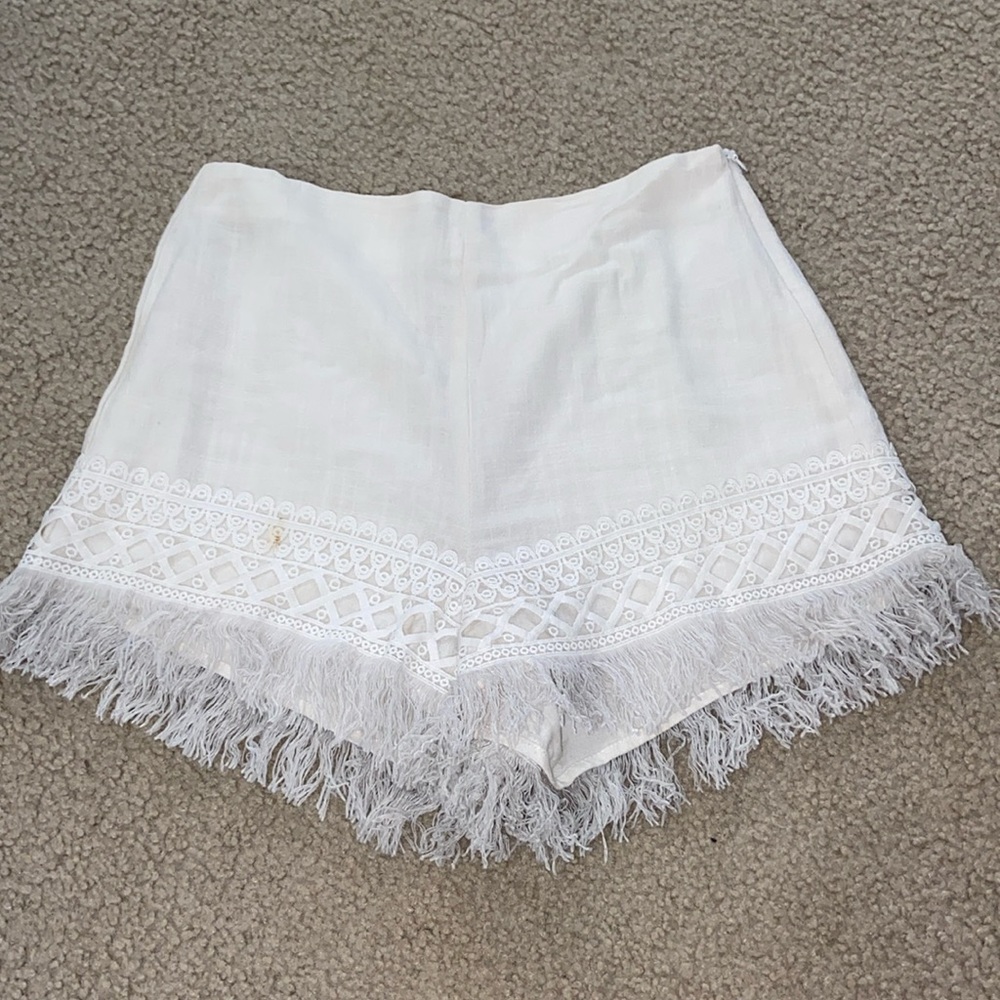 Cream Gianni Bini Shorts with fring and detail at the bottom. Size Medium